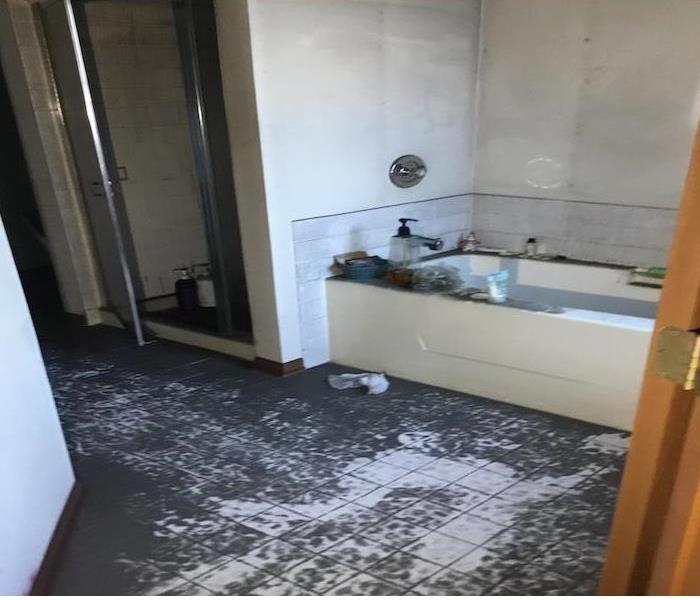 Master bathroom after fire damage